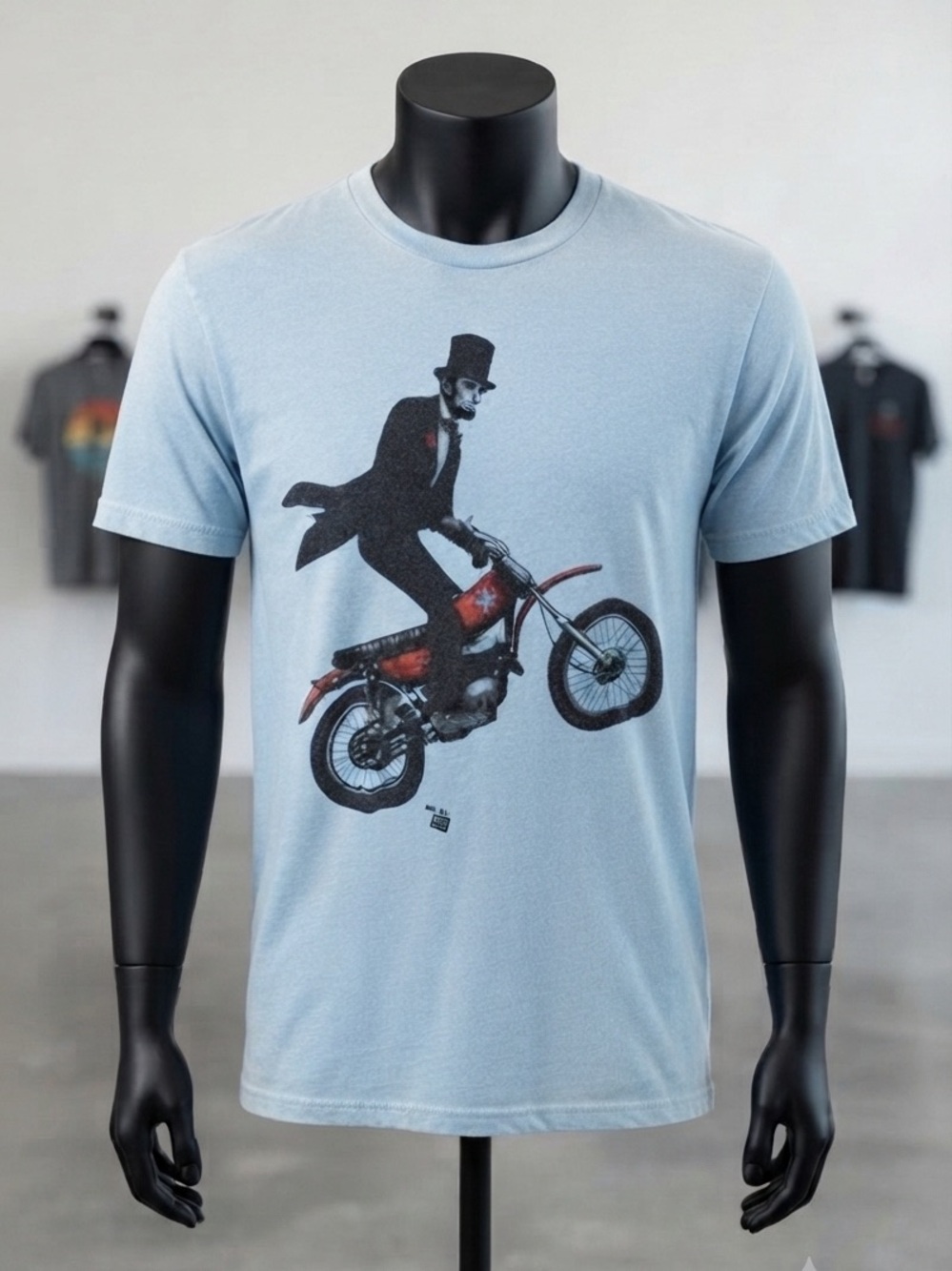 Ames Bros Men's Light Blue Graphic Tee with Abe Lincoln Dirt Bike